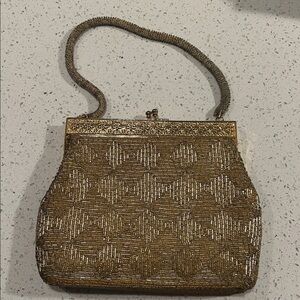 Chic Gold Beaded Clutch